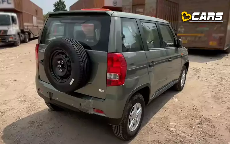 Mahindra bolero neo spied with new twin peaks logo